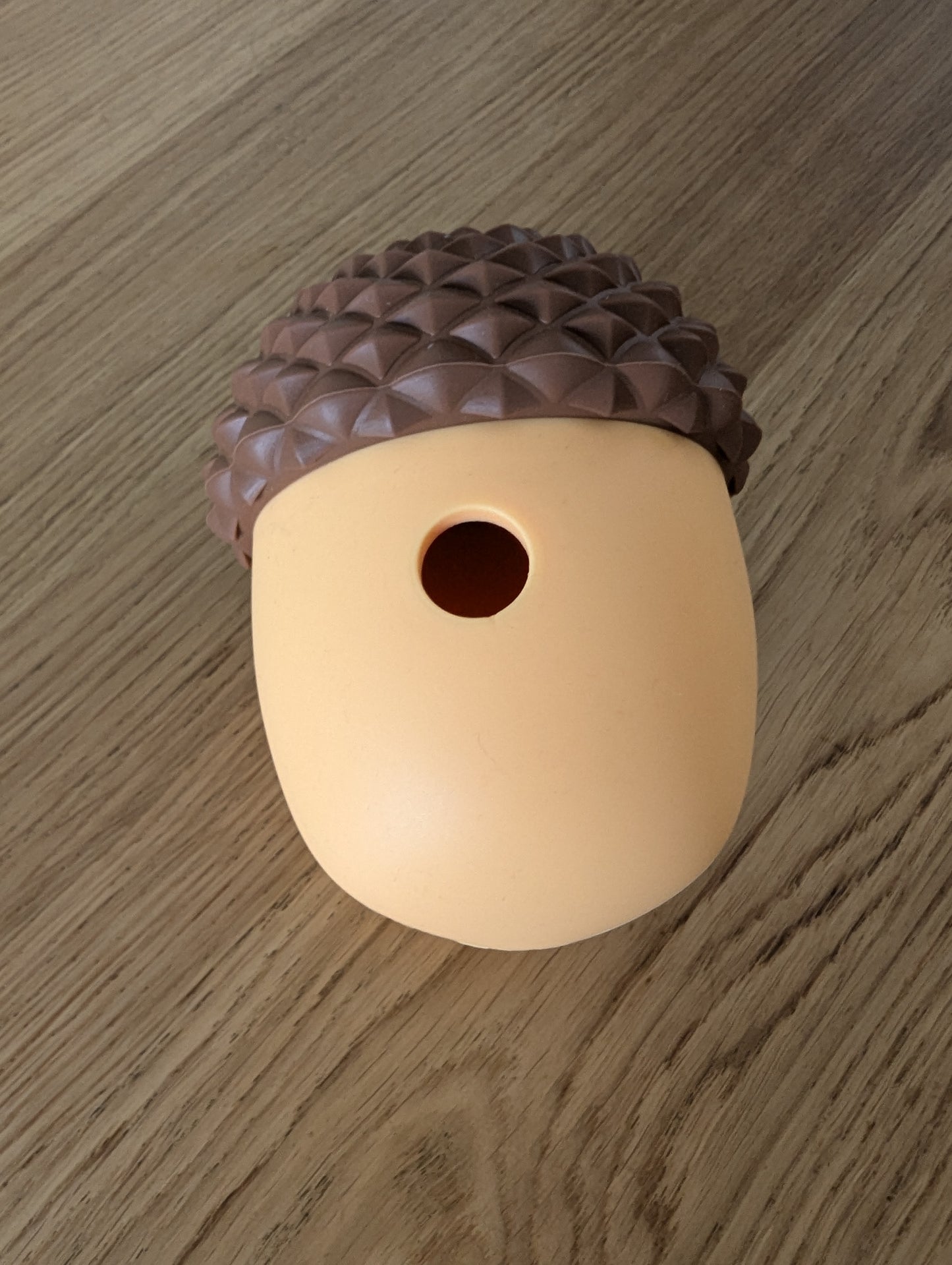 Acorn treat dispenser