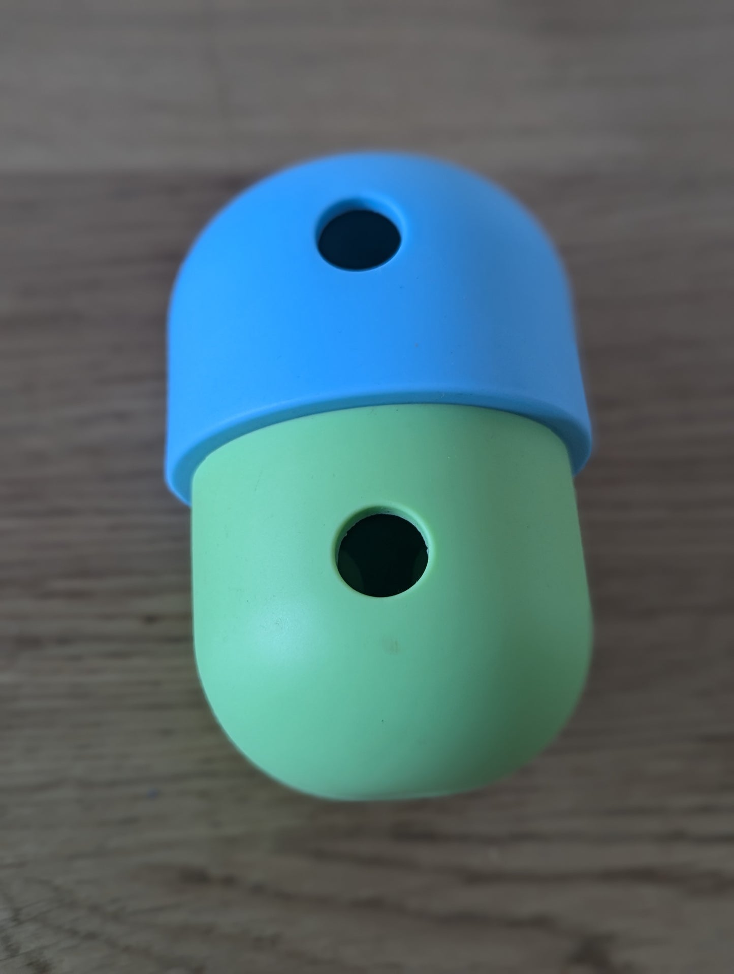 Green and blue treat dispenser